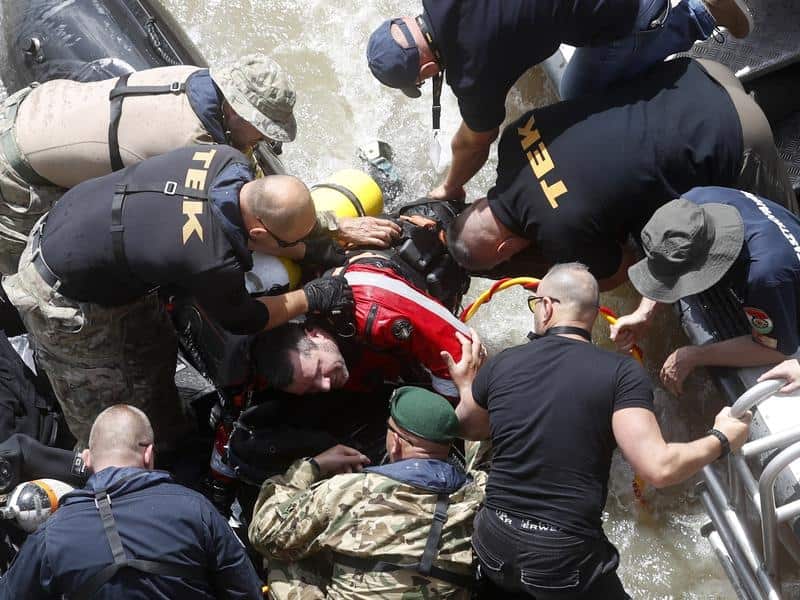 A rescue diver gets out from a Danube River