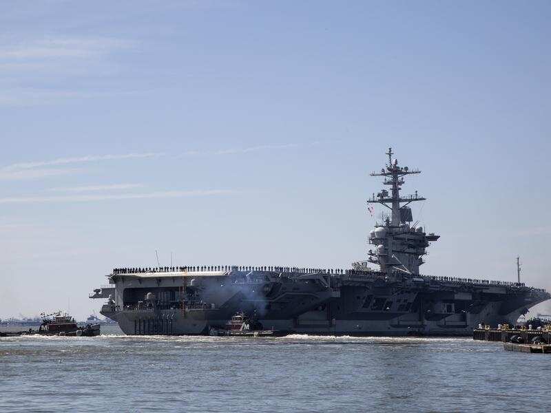 USS Abraham Lincoln deploys from Naval Station Norfolk, in the