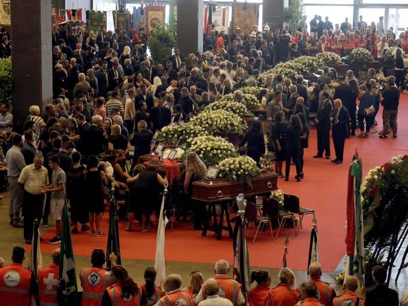 The row of coffins in the exhibition centre