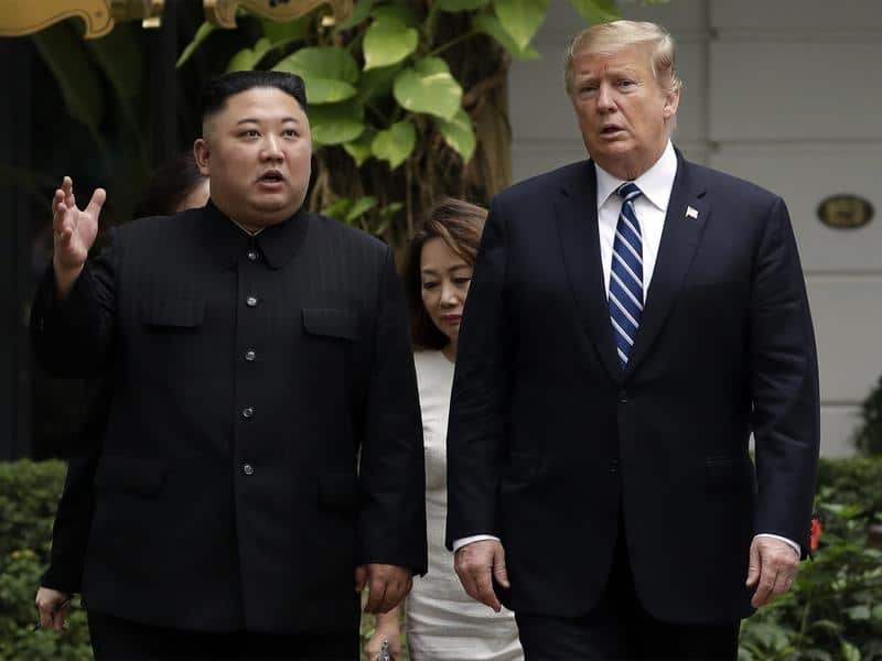 A file image of Kim Jong-un and Donald Trump in Hanoi