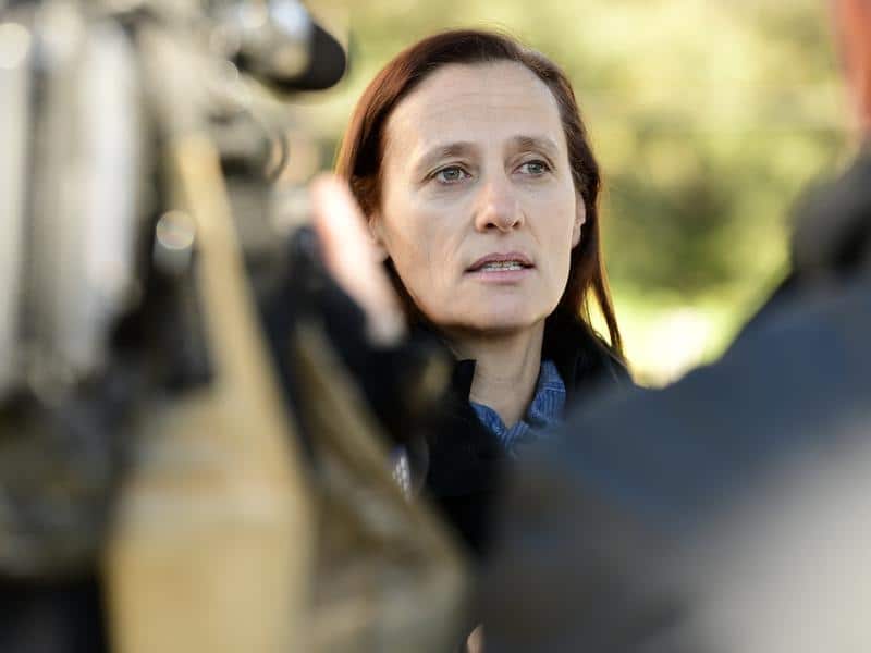 Dr Hester Wilson speaks to the media at the Coroner's Court .