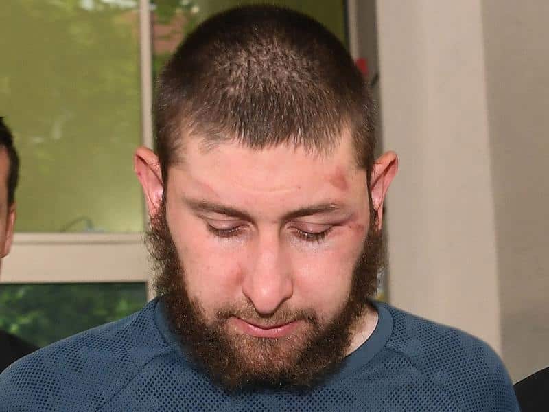 Terrorism suspect Ertunc Eriklioglu has faced court in Melbourne with two other men.