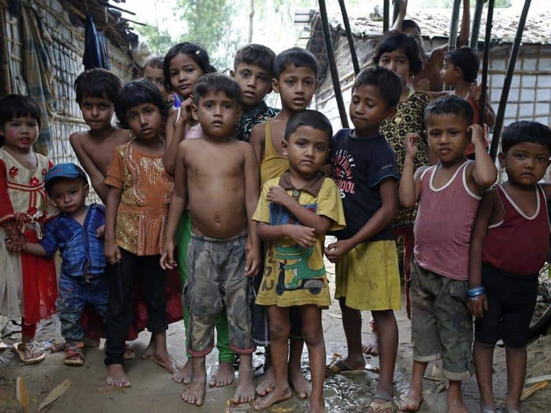 Rohingya children at a refugee camp in Bangladesh, one year after a brutal military crackdown forced them to flee Myanmar. 