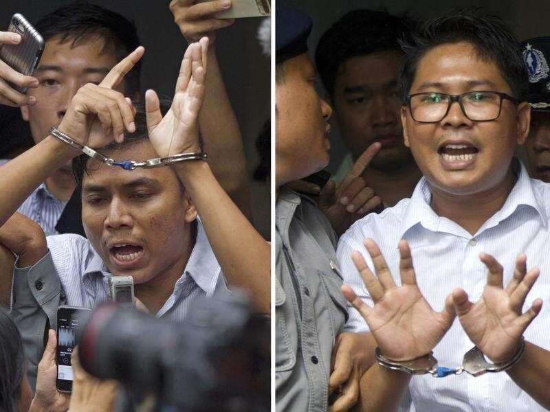 Reuters journalists Kyaw Soe Oo, left, and Wa Lone
