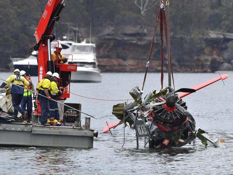 Investigators are still don't know why a seaplane crashed in a narrow bay, killing all six on board. 