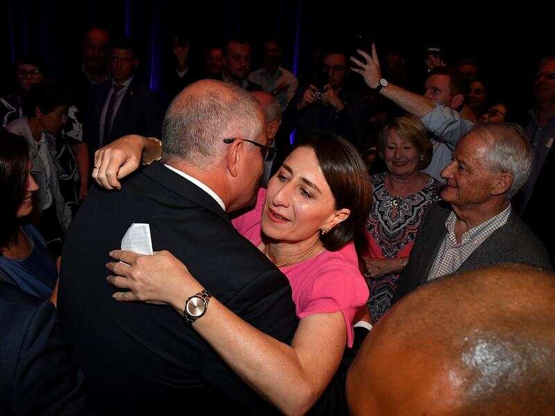 NSW Premier Gladys Berejiklian celebrates her win on Saturday night.