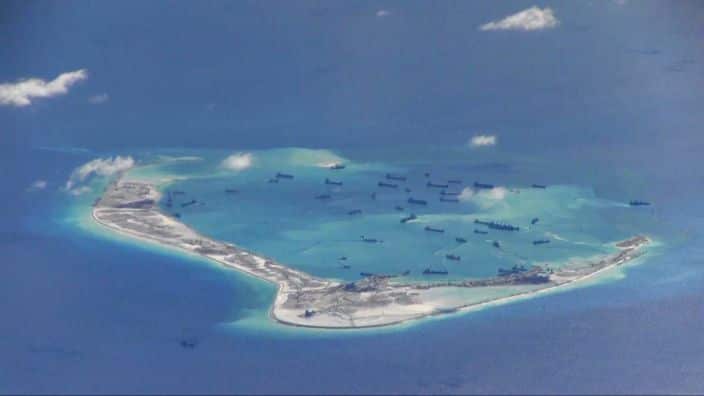 China has been building military facilities on reefs and small islands in disputed areas of the South China Sea.