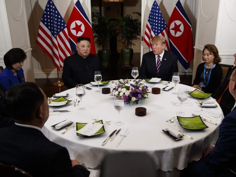 President Donald Trump and North Korean leader Kim Jong Un at dinner