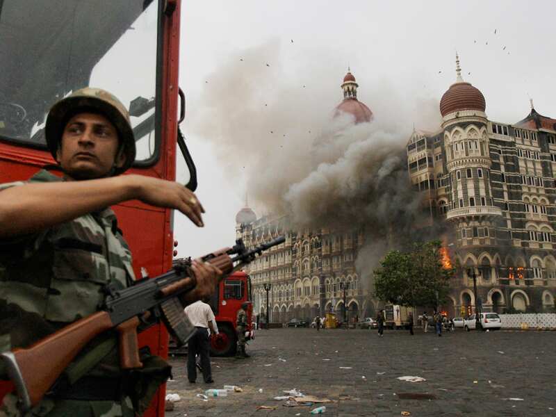 The Taj Mahal hotel in Mumbai burns during a terror attack.