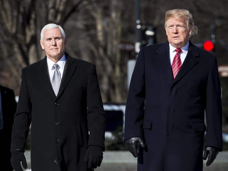 Mike Pence and Donald Trump at the memorial