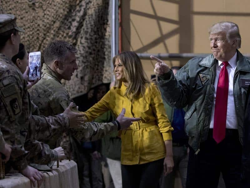 President Donald Trump and first lady Melania Trump greet US troops at an air base in Iraq.