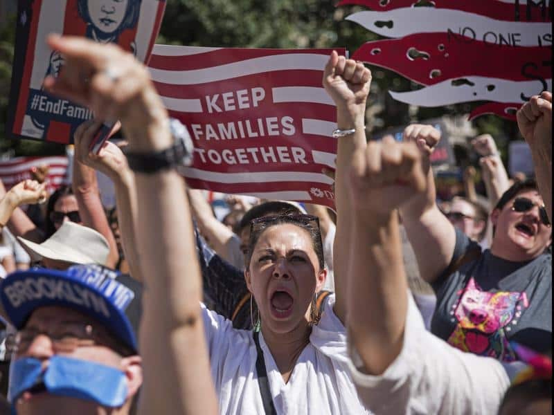 Activists shout during a rally in New York