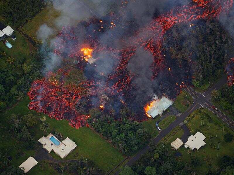 Lava flows into a residential estate in Hawaii