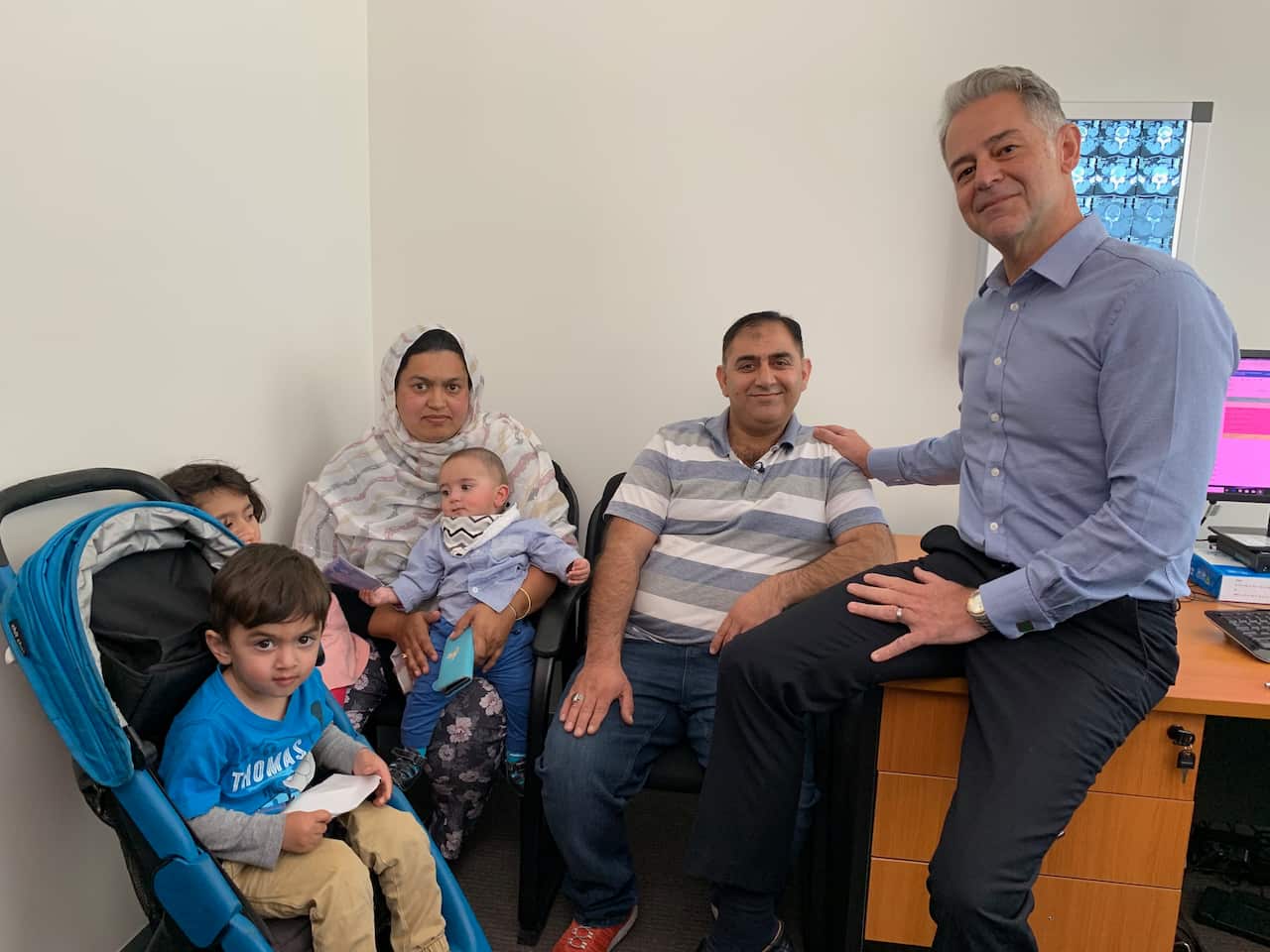 Dr John Best with Sadaqad and his family