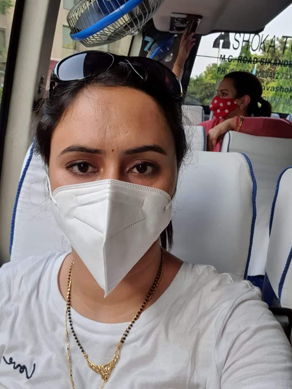 Anu on a bus while in India