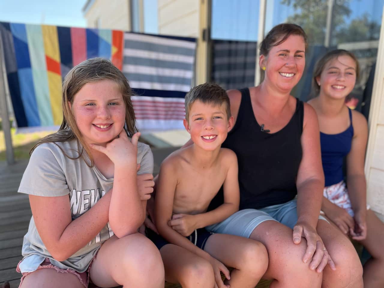 Picture of mother and three children.