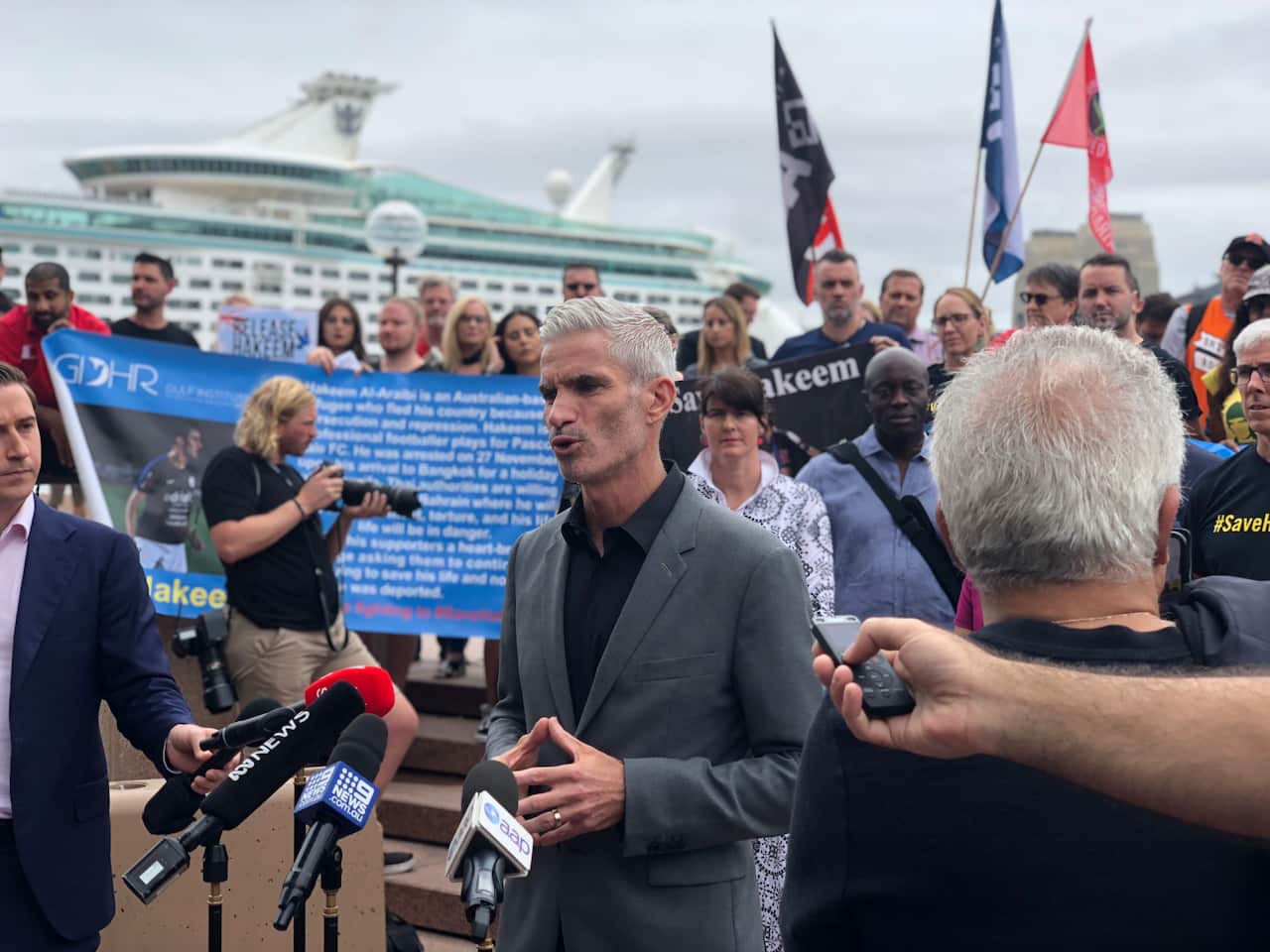 "A young man needs our help," said former Socceroos captain Craig Foster at the rally in Sydney.
