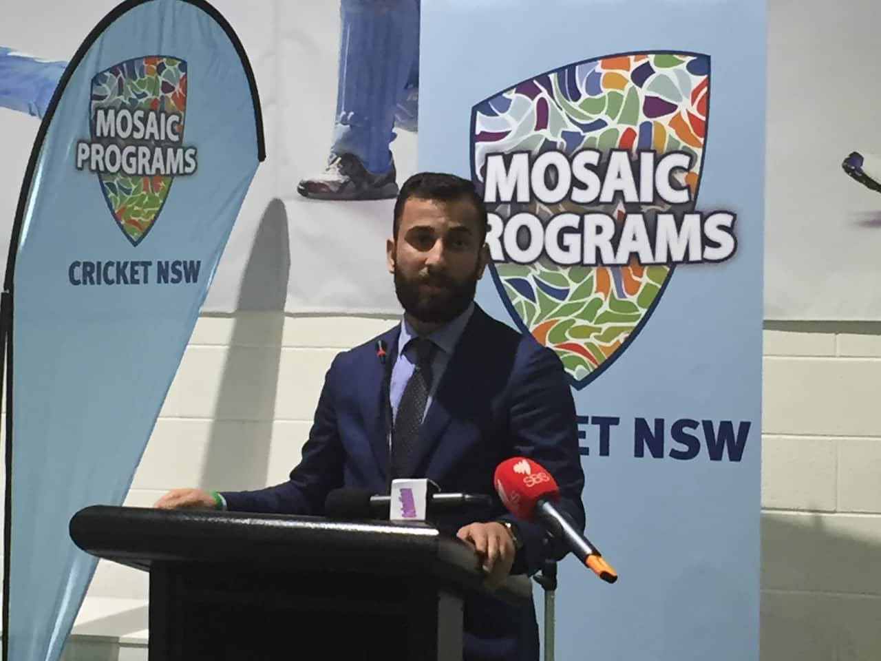 Cricket Australia's Community Engagement Manager, Sam Almaliki, addresses the Mosaic Cricket Program celebration in Blacktown