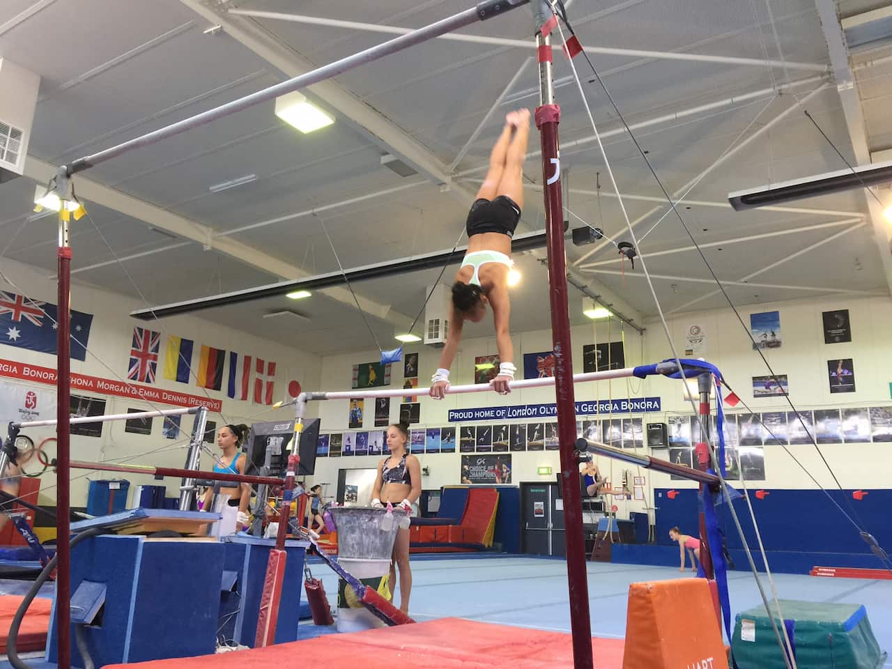 Jade Vella-Wright on the uneven bars