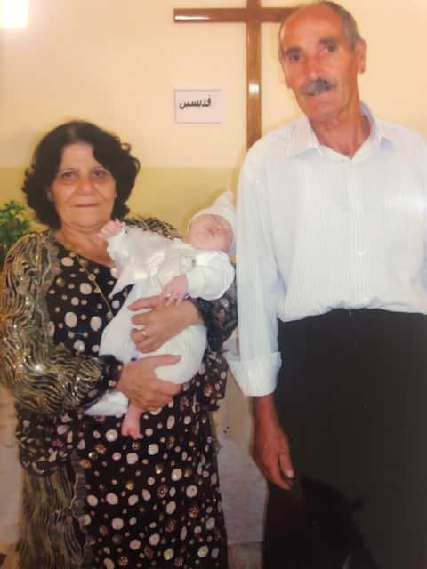 Parents Maryam and George Kalka with baby Adrian