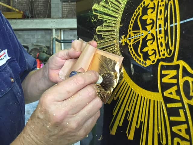 Billy Sing's story is now carved and gold plated into a black granite slab in a Brisbane cemetery. (Stefan Armbruster/SBS)
