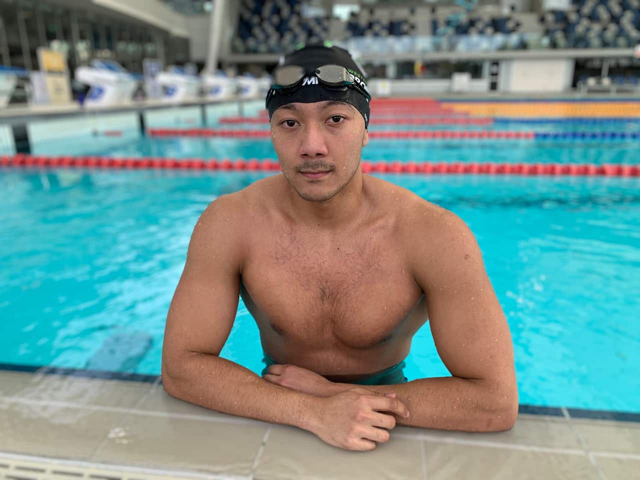 Professional swimmer Win Htet Oo is calling on the IOC to denounce the Myanmar Olympic Committee.