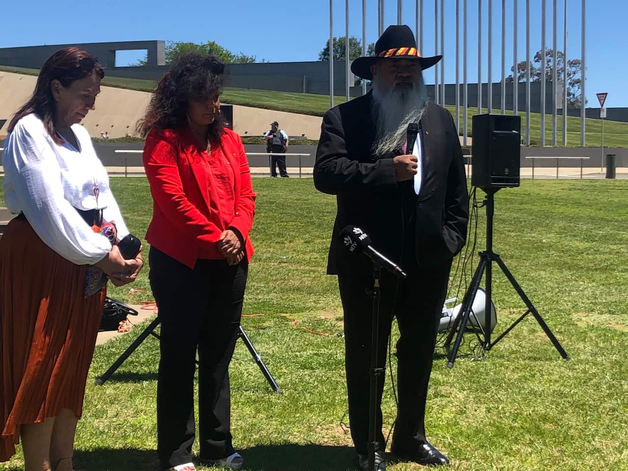 Senator Pat Dodson speaks to supporters outside Parliament House.