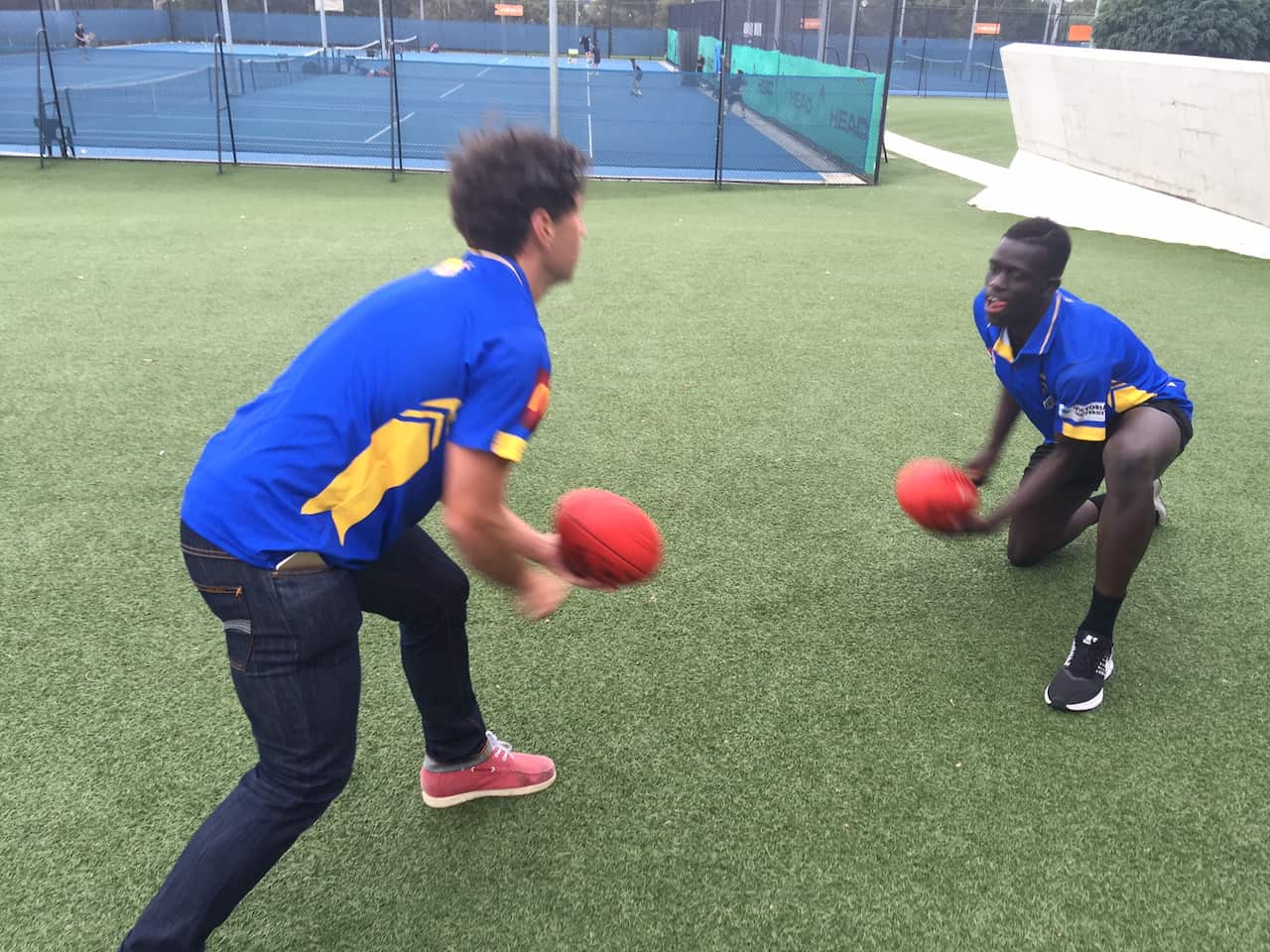 Buku Khamis in training with coach Torin Baker