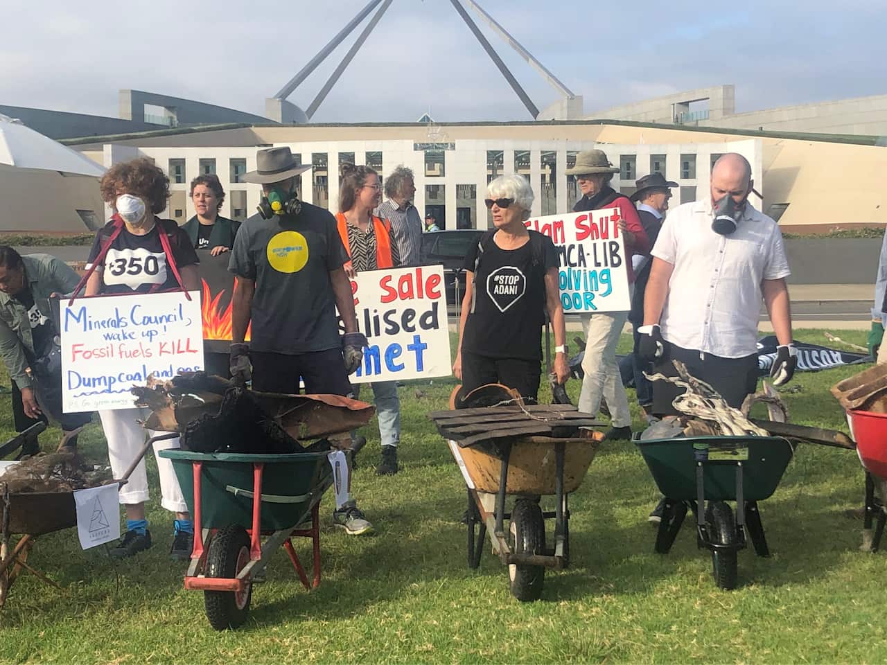 Bushfire survivors outside Parliament House.