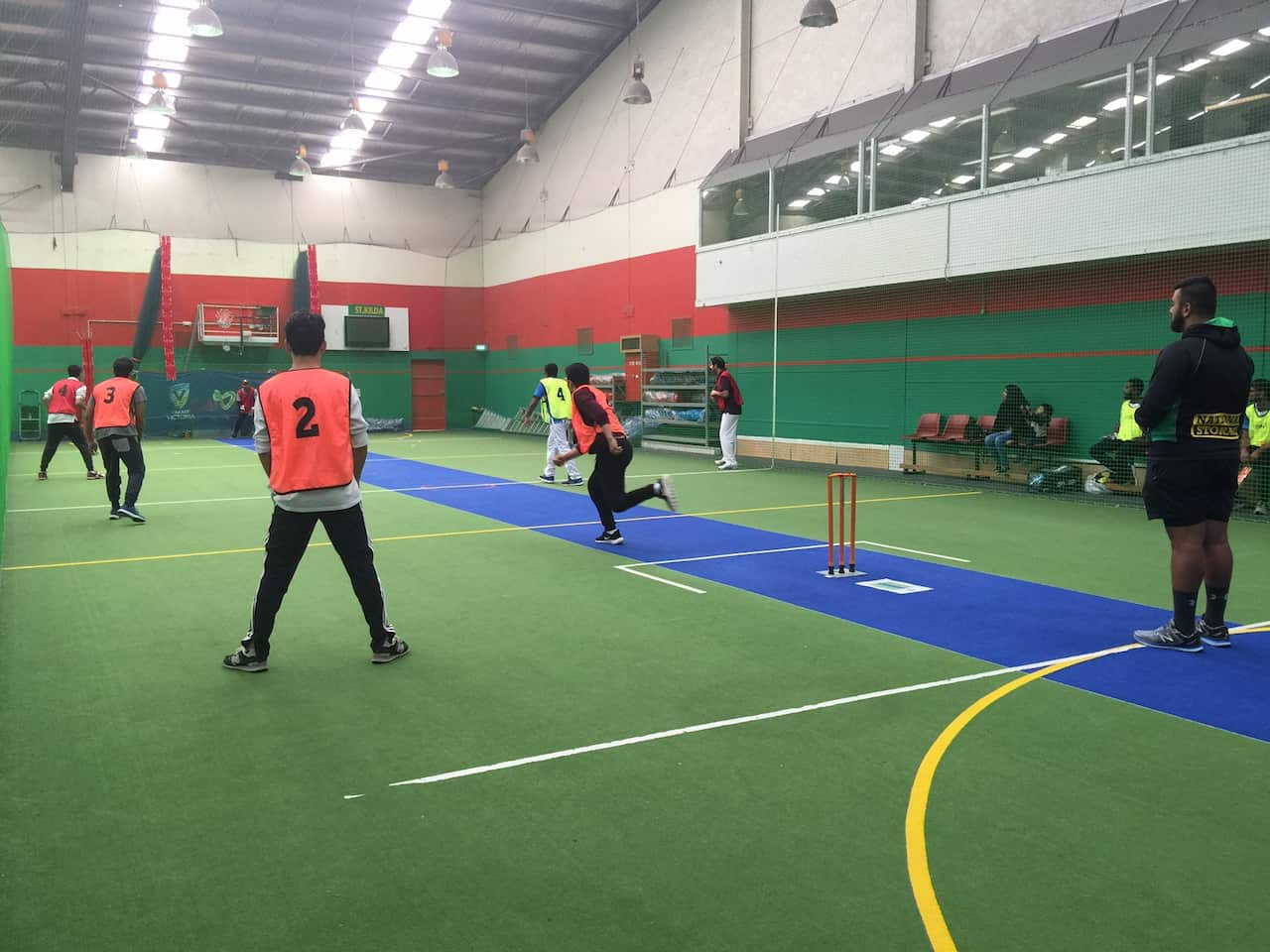 Playing indoor cricket tournament