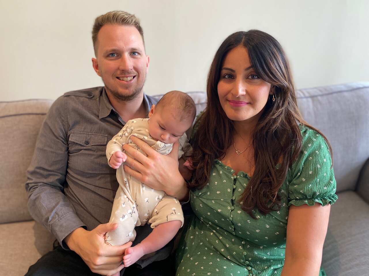 Sydney mother Nicci Valadi with her three-month-old son and partner.