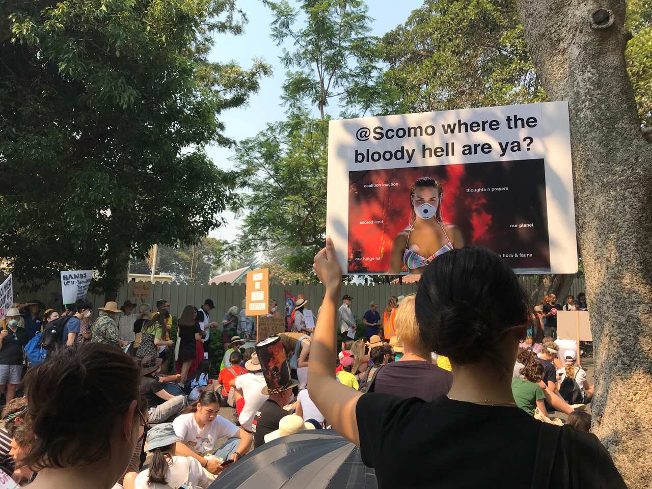 Protesters say the prime minister's holiday is badly timed. 