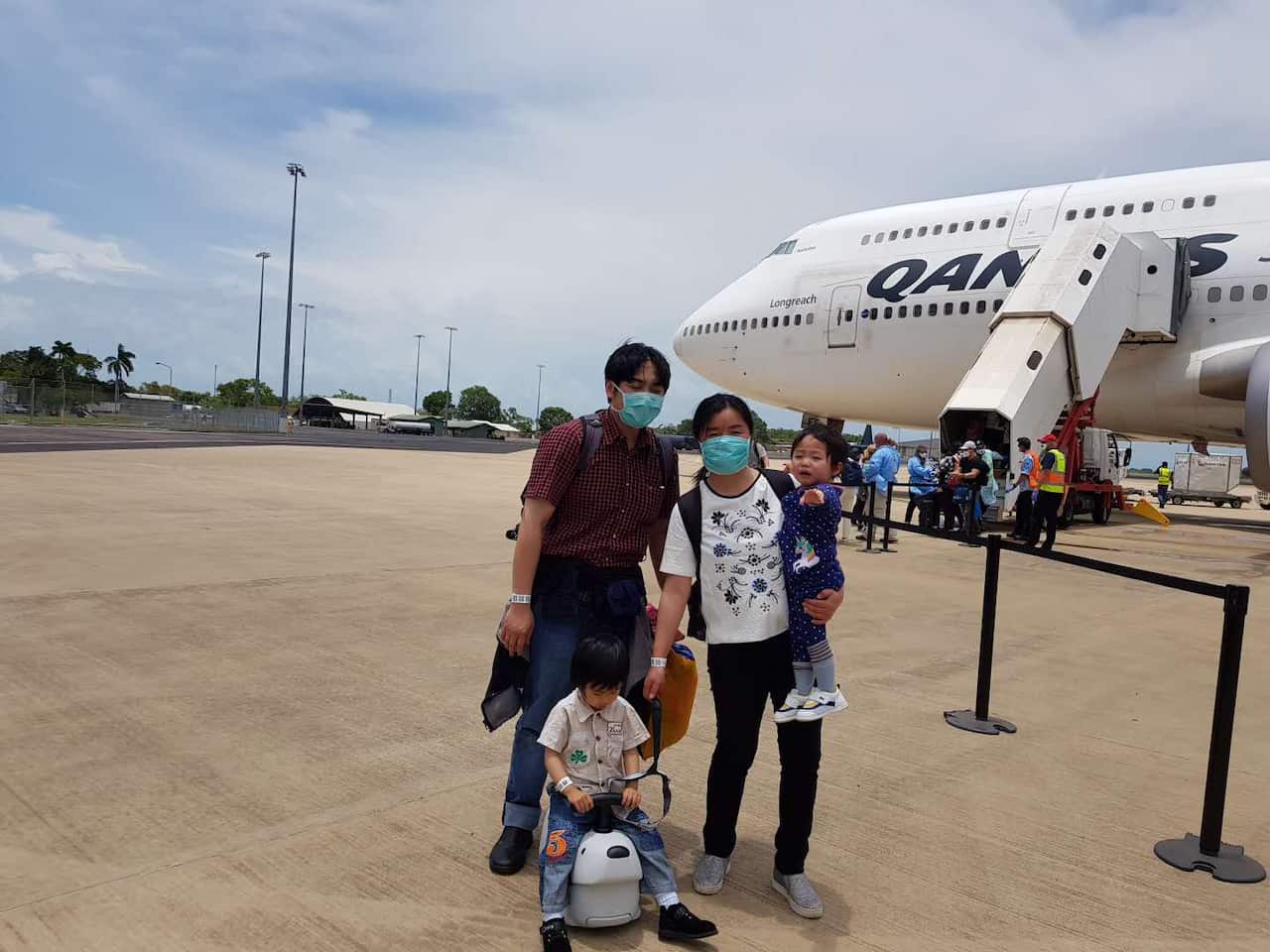 Ying Wung and her family after landing in Darwin