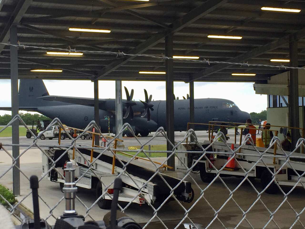 A C-130 Hercules is seen on a runway at Christmas Island.