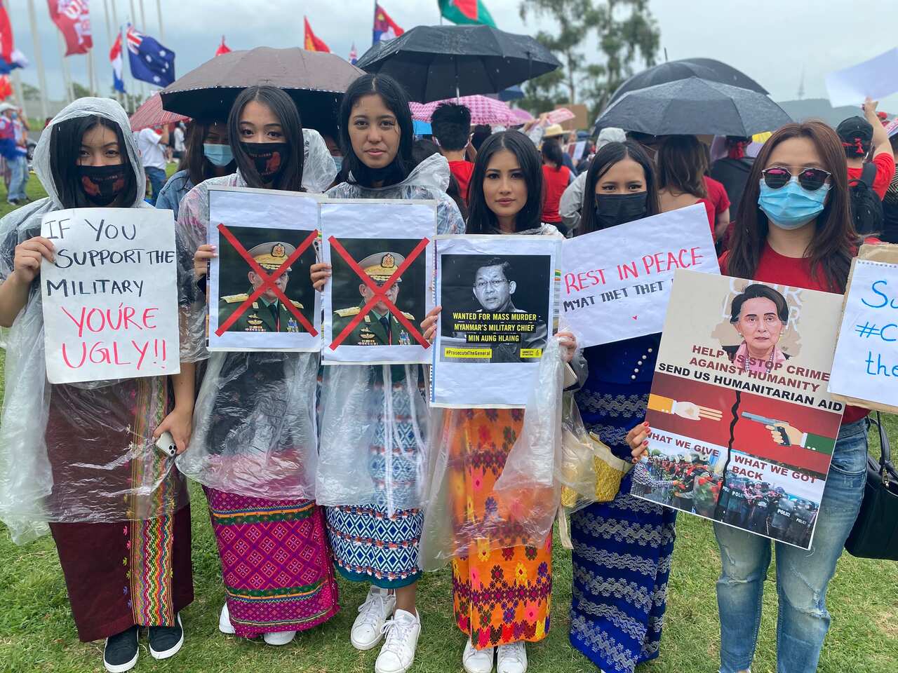 Khin Swe (third from right) is concerned about what the coup will mean for the country.