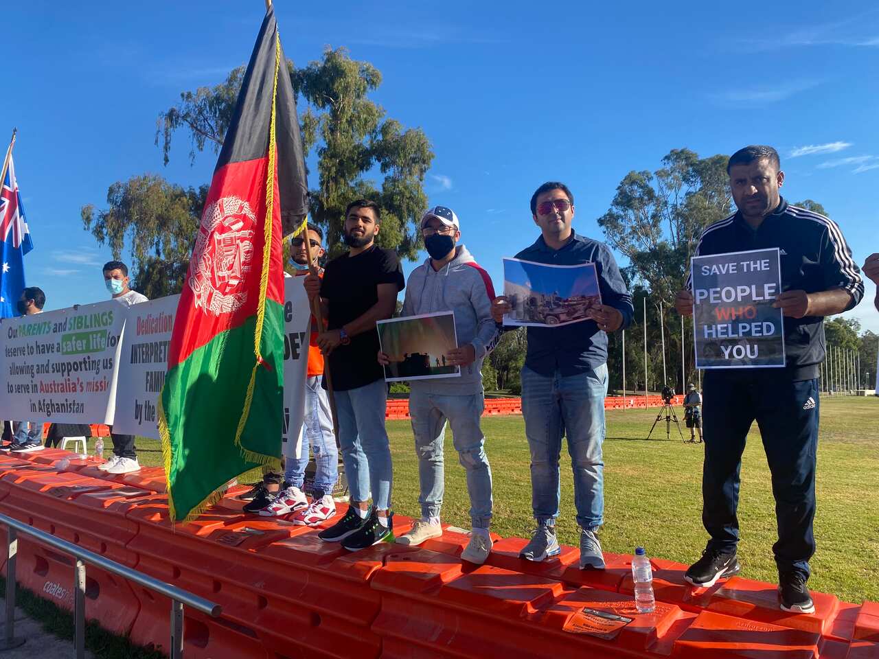 Protesters on the lawns outside Parliament House.