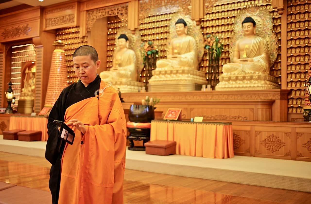 Reverend Miao Bo uses WhatsApp to connect with followers