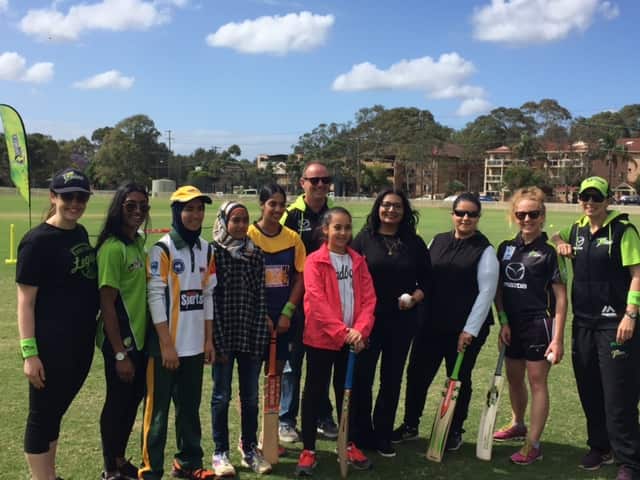 Sydney Thunder coaching staff and community players