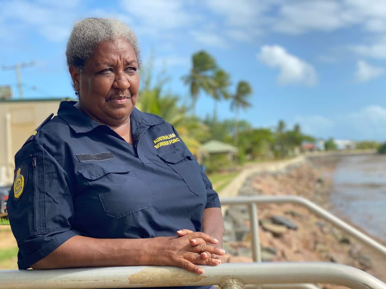 ABF Border Monitoring Officer Patricia Mooka watches the PNG coastline just kilometres away.