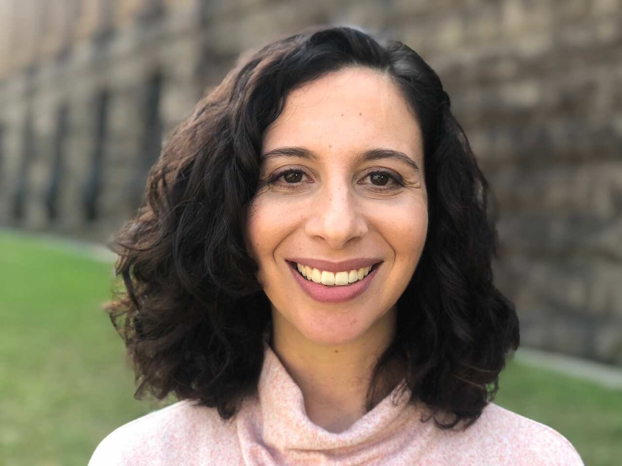 Rita Karagelinian says her Armenian family heritage plays an important role in her portraits, with themes of warmth and connection.