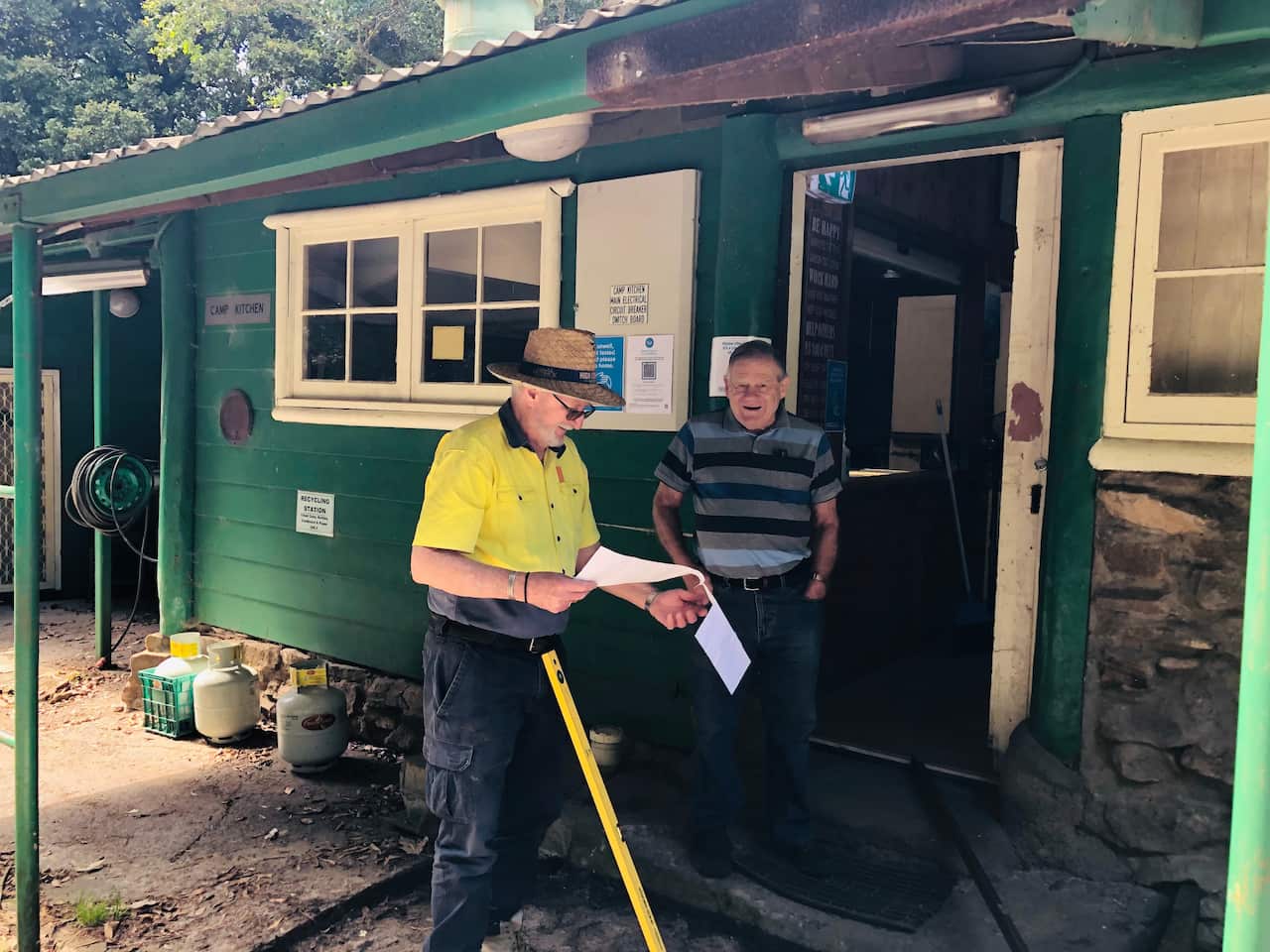 Richard Allen and Harry Phillips working on a footpath at the Mount Keira Scout Camp.