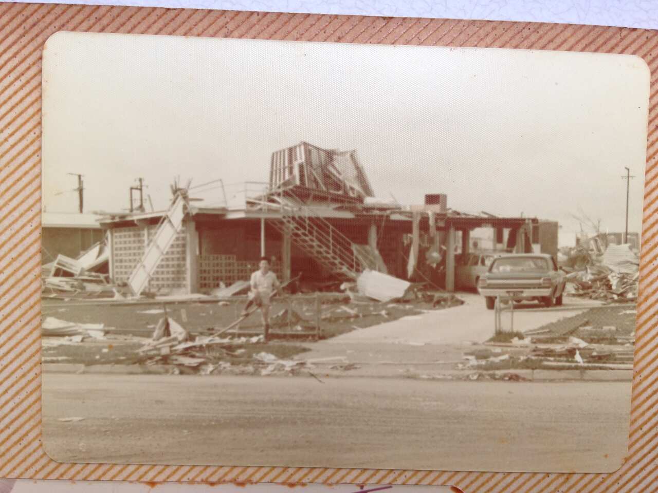 TT Lim in front of his old house. (Supplied)