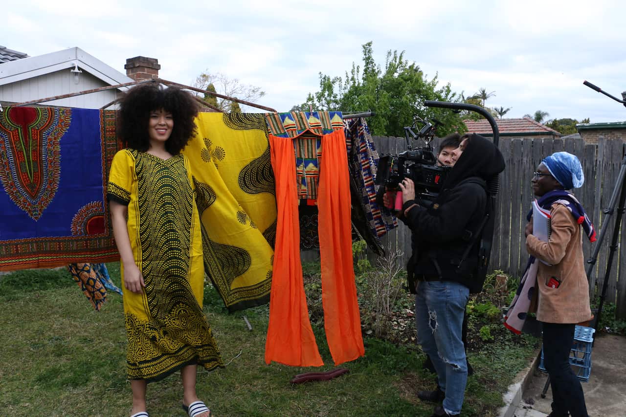 Hawanatu (right) directing one of her films.