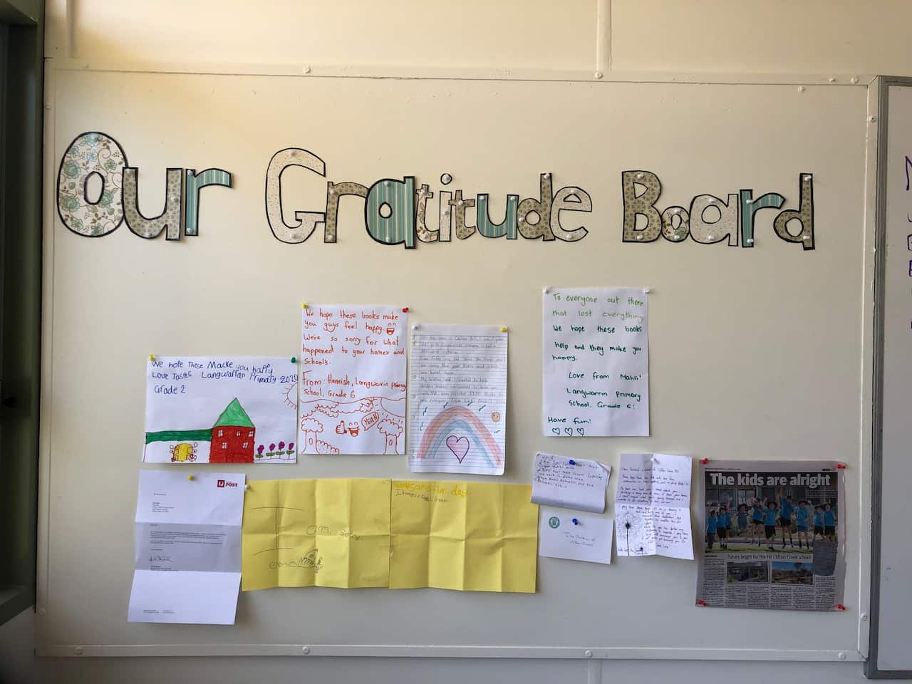 Gratitude board for CCPS students featuring overseas letters of support
