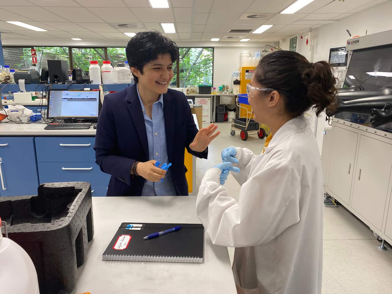 Dr Noushin Nasiri in discussion with a researcher at the NanoTech Laboratory at Macquarie University.