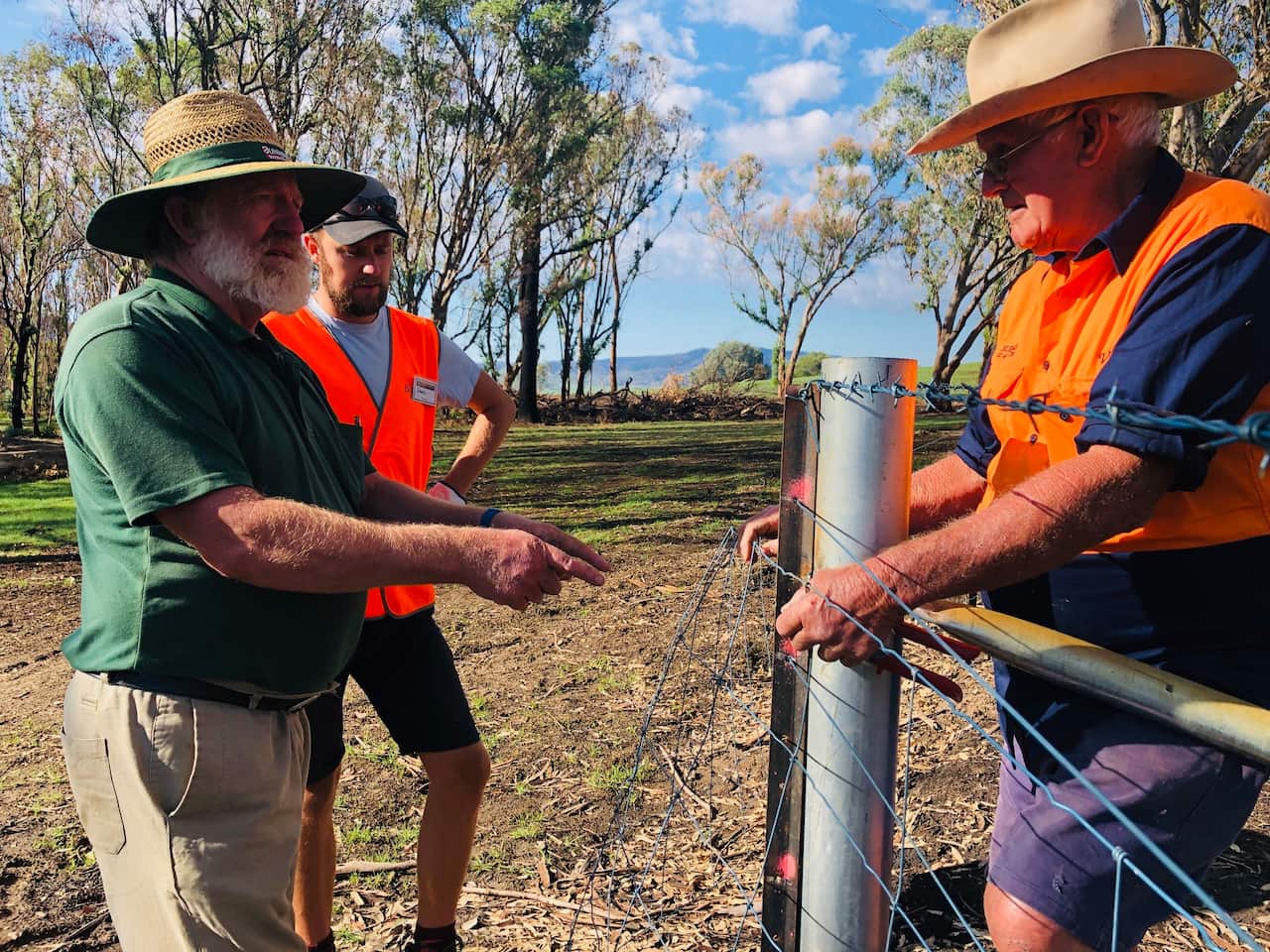 Norm Sharp and BlazeAid volunteers