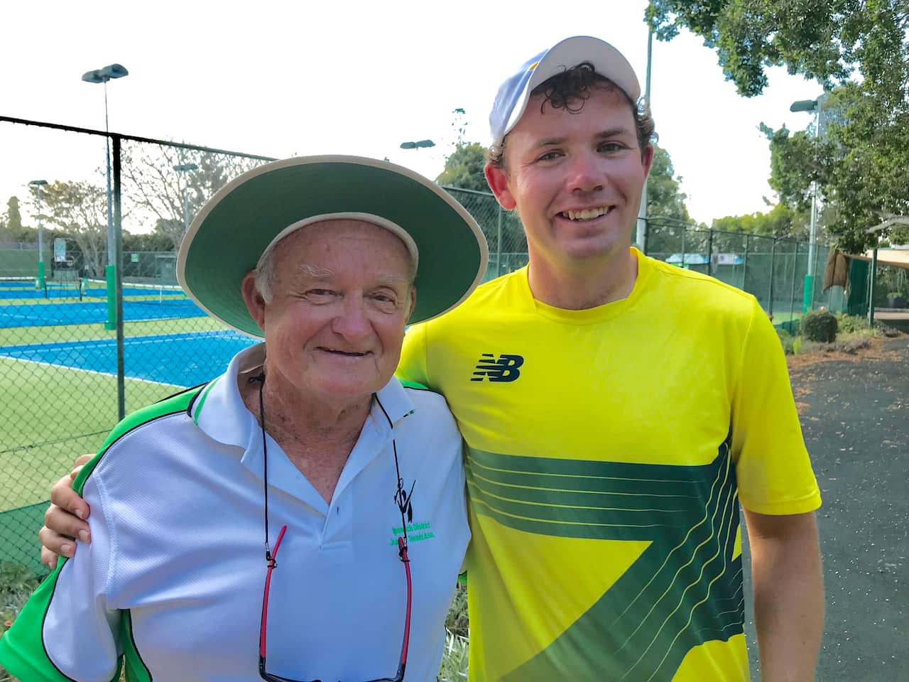 Tennis champ Archie Graham with coach Stan Cuthbert.