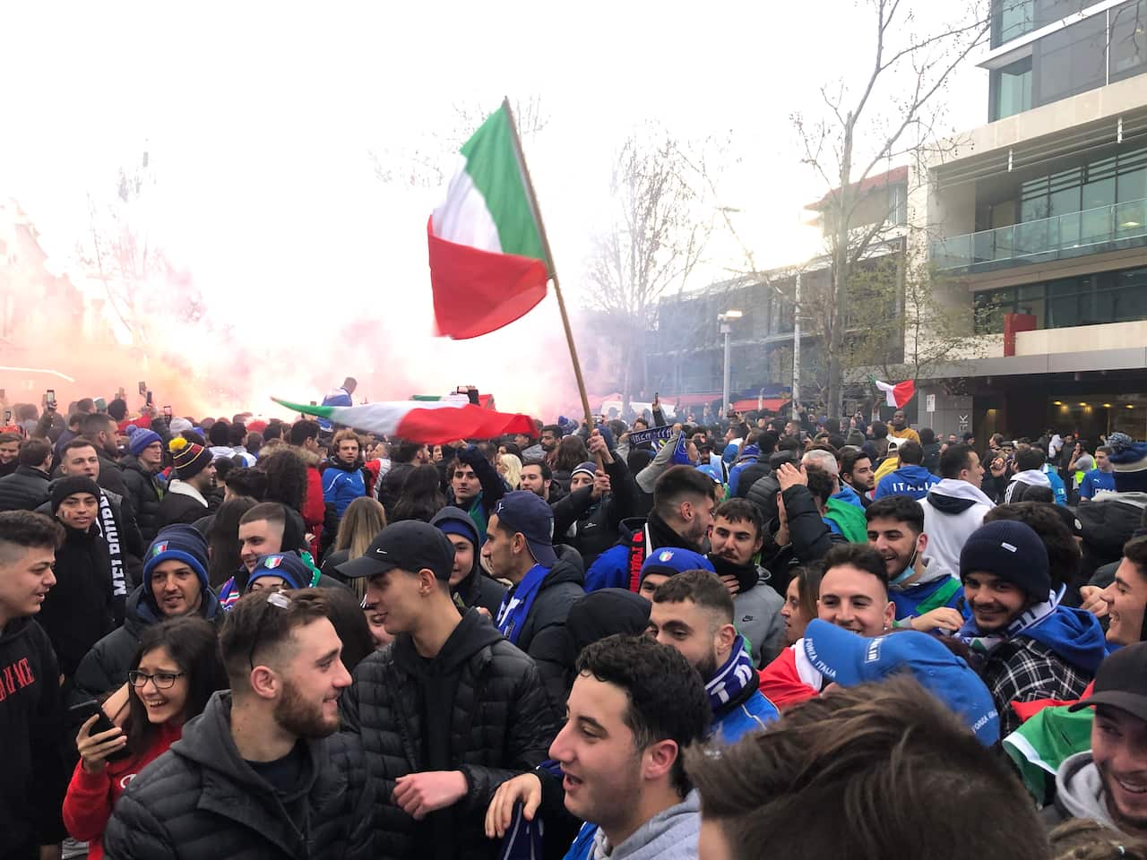 Fans celebrate Italy's win along Melbourne's popular Lygon Street, affectionately known as Melbourne's Little Italy. 