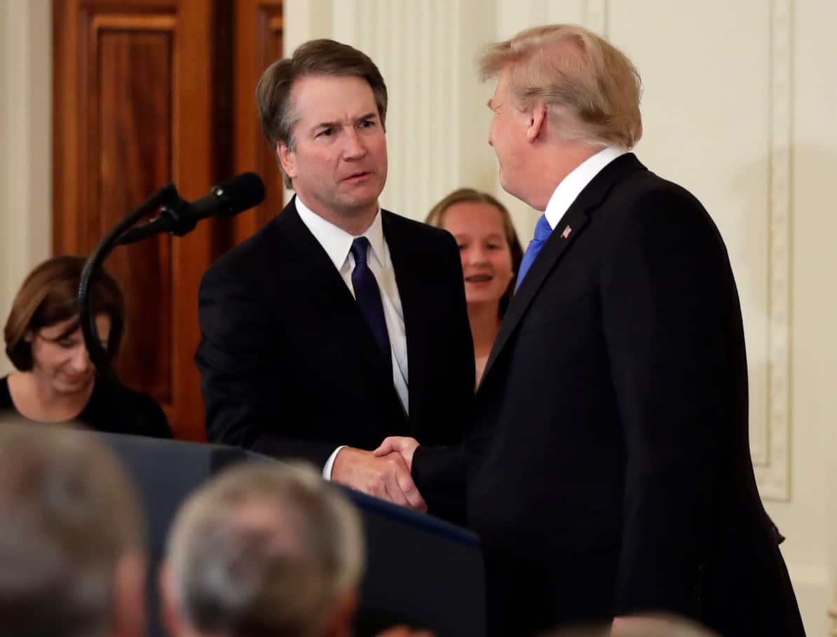 President Donald Trump shakes hands with Judge Brett Kavanaugh his Supreme Court nominee