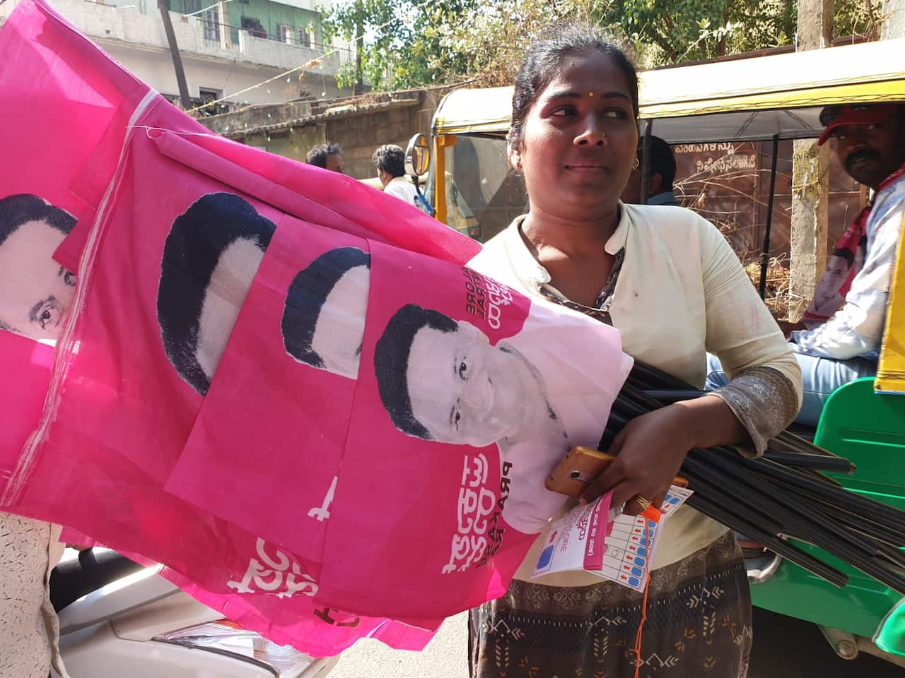 Supporters of the movie star with promotional material and flags. 